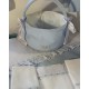 Cesta de cremas y pañales para la cómoda