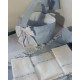 Cesta de cremas y pañales para la cómoda